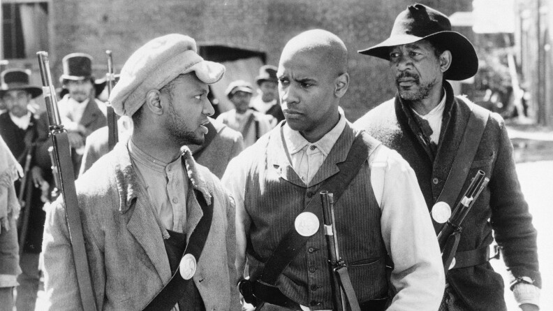 (L-R) Jihmi Kennedy, Denzel Washington and Morgan Freeman in the 1989 film "Glory." Washington won Best Supporting Actor Oscar for his performance. 