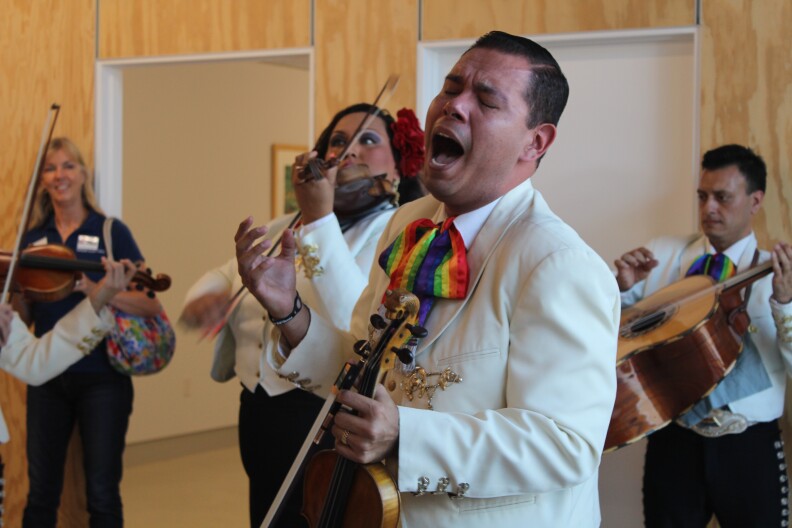 Mariachi Arcoiris de Los Angeles, an all-LGBT band, sings at the opening celebration of Mi Centro. The location is a new outpost in Boyle Heights as a collaboration between the Los Angeles LGBT Center and the Latino Equality Alliance.