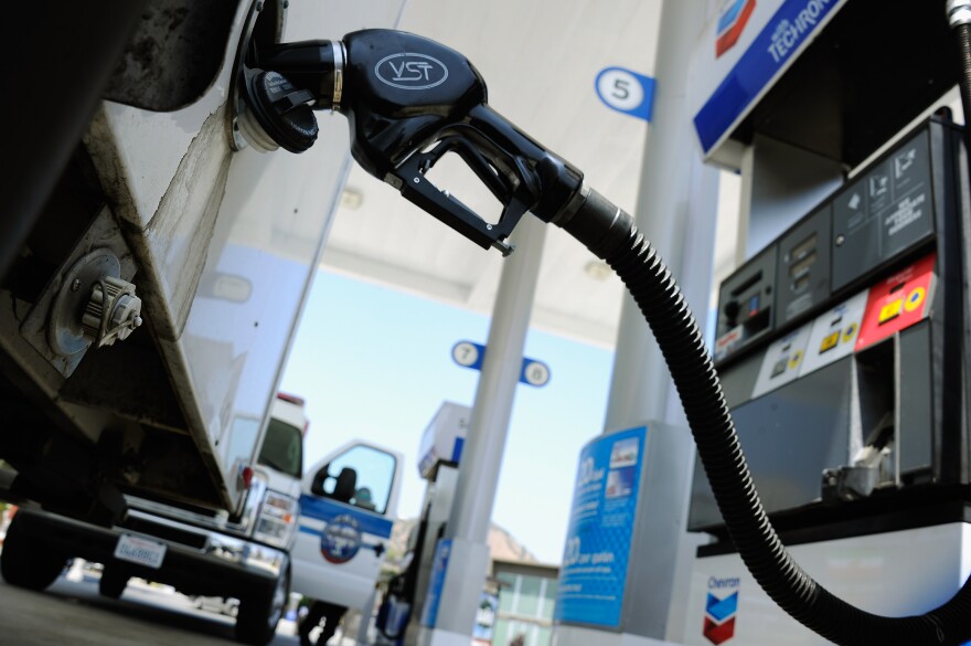 Customers pump gas at an Arco station on July 2, 2012 in Los Angeles, California. 