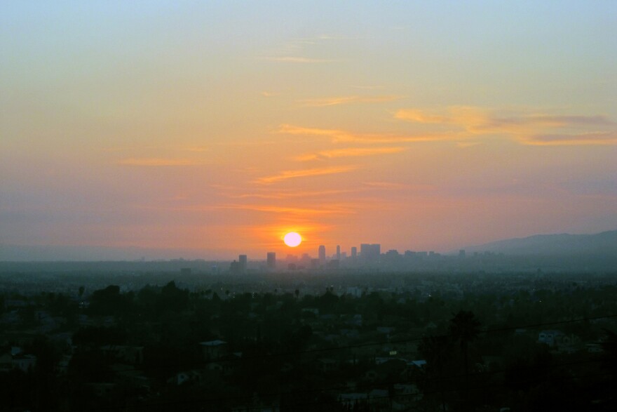 A haze of smog adds to the sunset as seen from downtown Los Angeles.