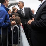 US President Barack Obama greets supporters at Toledo Express Airport in Bowling Green, Ohio, on September 26, 2012.