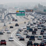 Traffic on the northbound and southbound lanes of the 110 Harbor Freeway starts to stack up during rush hour traffic on February 5, 2013 in Los Angeles.