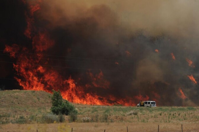 The Mills Fire appears to have erupted on a small mountain range bordered on three sides by Redlands, Mentone and Yucaipa on June 28, 2013.