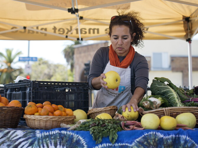 Rosario Mireles is an operations associate for Village Market Place. The produce stands are part of Community Services Unlimited, a non-profit in South Los Angeles.