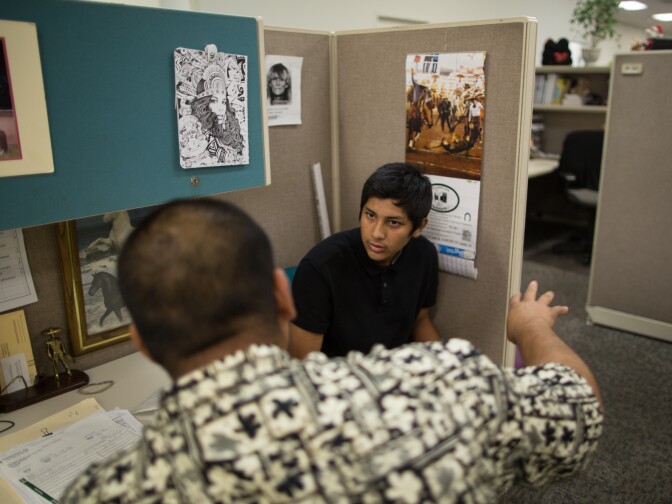 Damian speaks with his probation officer.