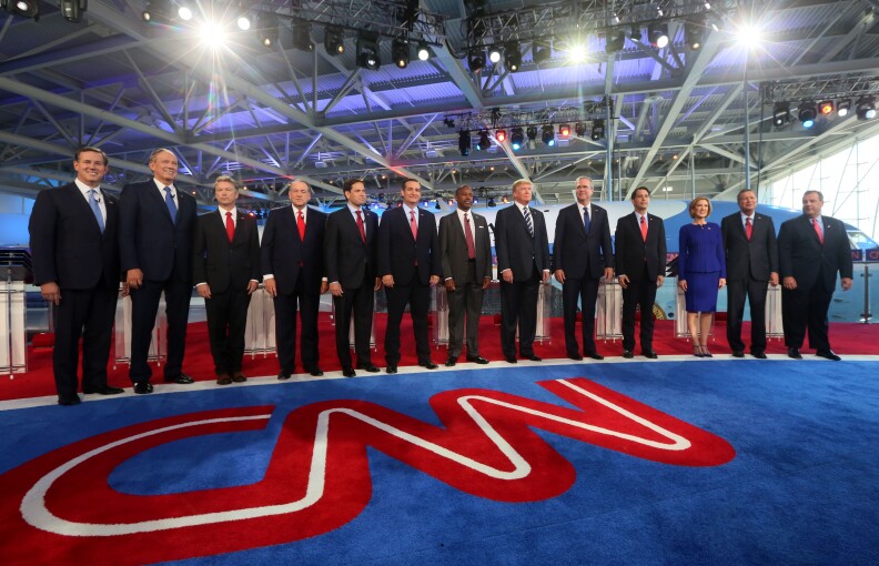 SIMI VALLEY, CA - SEPTEMBER 16:  Republican presidential candidates (L-R) Rick Santorum, George Pataki, U.S. Sen. Rand Paul (R-KY), Mike Huckabee, U.S. Sen. Marco Rubio (R-FL) , U.S. Sen. Ted Cruz (R-TX),  Ben Carson, Donald Trump, Jeb Bush, Wisconsin Gov. Scott Walker, Carly Fiorina, Ohio Gov. John Kasich and New Jersey Gov. Chris Christie stand onstage during the presidential debates at the Reagan Library on September 16, 2015 in Simi Valley, California. Fifteen Republican presidential candidates are participating in the second set of Republican presidential debates.  (Photo by Sandy Huffaker/Getty Images)