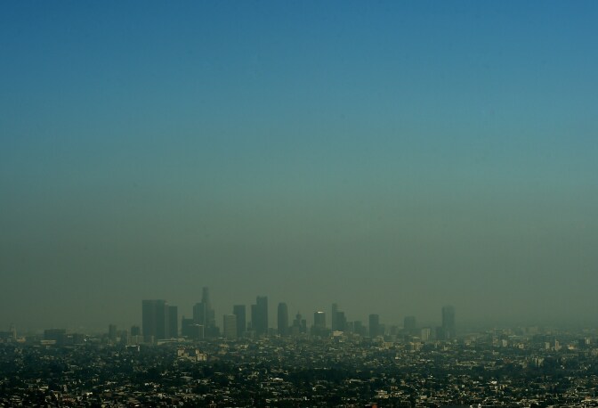 A view of the Los Angeles city skyline as heavy smog shrouds the city in California on May 31, 2015.           AFP PHOTO/ MARK RALSTON        (Photo credit should read MARK RALSTON/AFP/Getty Images)