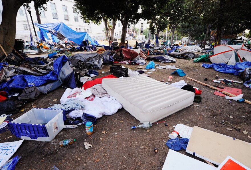 LOS ANGELES, CA - NOVEMBER 30:  Debris and belongings of Occupy Los Angeles remain in the empty encampment at City Hall following the Los Angeles Police Department raid on November 30, 2011 in Los Angeles, California. Protesters remained on the City Hall lawn despite a deadline, set by Los Angeles Mayor Antonio Villaraigosa, to dismantle their campsite and leave the park which the city declared closed as of 12:01 am November 28th.  (Photo by Kevork Djansezian/Getty Images)