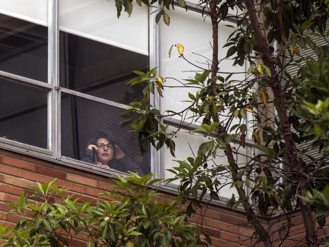 People inside the Life Sciences building remain sheltered in place on Wednesday, June 1, 2016 following a murder-suicide on the University of California, Los Angeles campus.