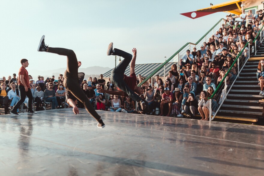 Dancers from Jacob Jonas The Company perform on the Santa Monica Pier during 2017's To the Sea: Dance Concerts on the Pier event, which is part of the Dance + Camera Festival.