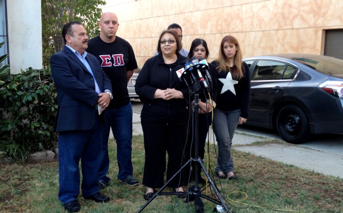 Friends and family of Carlos and Marcela Franco — a father and his daughter killed in Friday's shooting rampage —held a press conference Sunday night, asking for donations to help them pay for funeral and burial expenses. From left: Monty Perez, Marcela's step uncle; Ryan Payne, Marcela's boyfriend; Margaret Quinones-Perez, Marcela's aunt; Giovanni Gonzalez, a family friend; Laticia Franco, Marcela's sister; and Sandra Franco, her cousin.