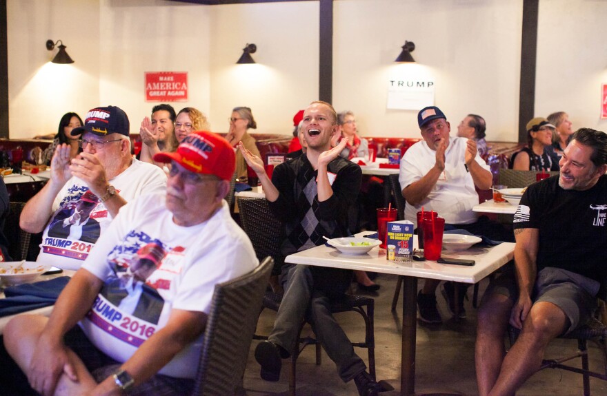 Trump supporters watch the second presidential debate at JJ's Bar & Grill in Santa Clarita, Calif. on Sunday, Oct. 9, 2016.