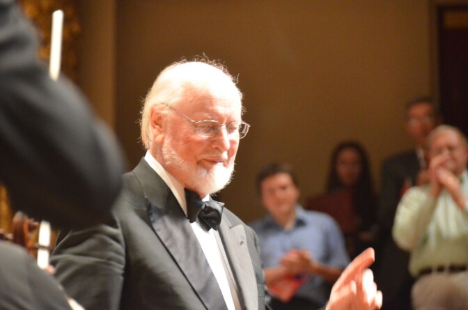 Film composer John Williams is seen on stage in 2011.