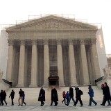 WASHINGTON, DC - MARCH 26:  Members of the public enter the Supreme Court March 26, 2013 in Washington, DC. Today the Supreme Court is scheduled to hear arguments in California's proposition 8, the controversial ballot initiative that defines marriage as between a man and a woman.  (Photo by Win McNamee/Getty Images)