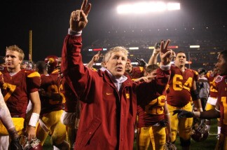 Head coach Pete Carroll of the USC Trojans celebrates after defeating the Boston College Eagles during the 2009 Emerald Bowl at AT&T Park on December 26, 2009 in San Francisco, California.