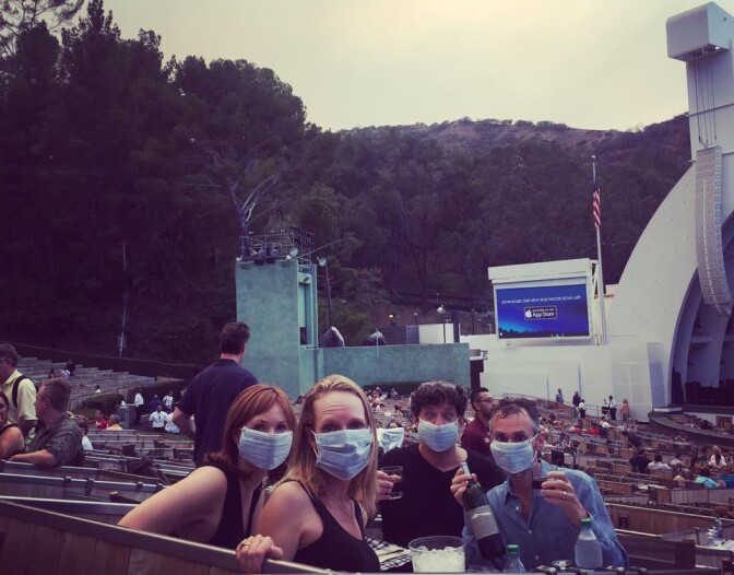 Concertgoers at the Hollywood Bowl wear face masks amid the smoke of the Sand Fire.