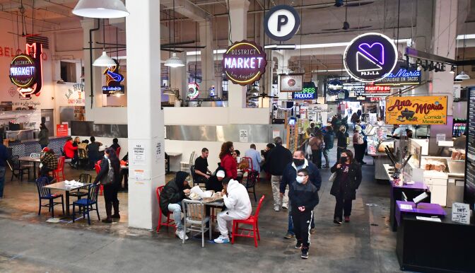 People enjoy lunch at Grand Central Market as indoor dining reopens in Los Angeles, on March 15, 2021. - Los Angeles and southern California is allowed to partially reopen indoor dining and movie theaters Governor Gavin Newsom announced last week, as the region hit key health criteria.
Slammed by a brutal Covid-19 pandemic winter spike, California has seen a rapid decline in infection rates in recent weeks as a vaccination rollout has delivered at least one dose to nearly a fifth of residents. (Photo by Frederic J. BROWN / AFP) (Photo by FREDERIC J. BROWN/AFP via Getty Images)