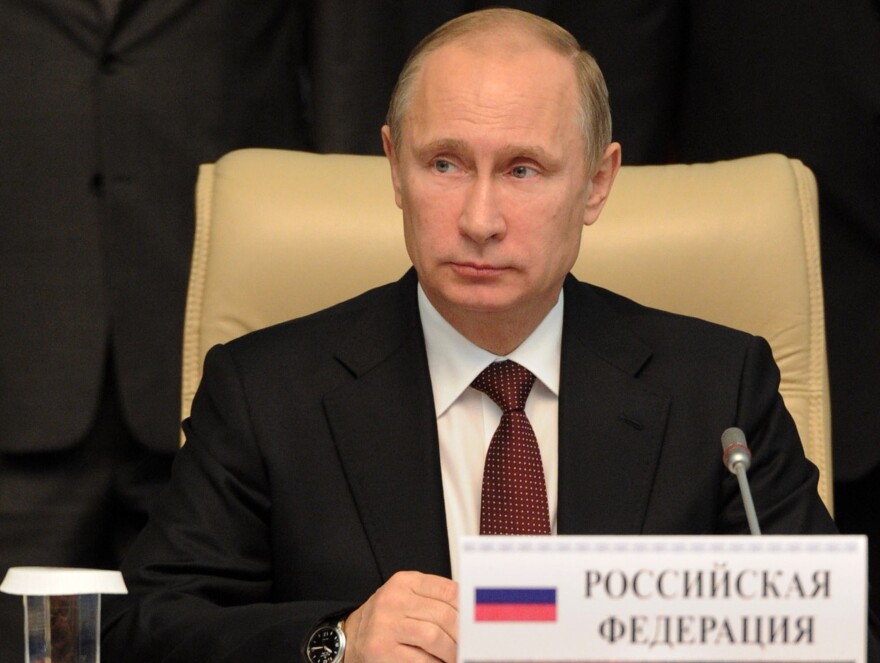 Russia's President Vladimir Putin takes part in a summit of the Shanghai Cooperation Organization (SCO) at the Ala-Archa state residence in Bishkek, on September 13, 2013. Putin said today the global community should welcome Syria's decision to join a ban on chemical weapons, saying it shows the 'serious intentions' of Damascus.