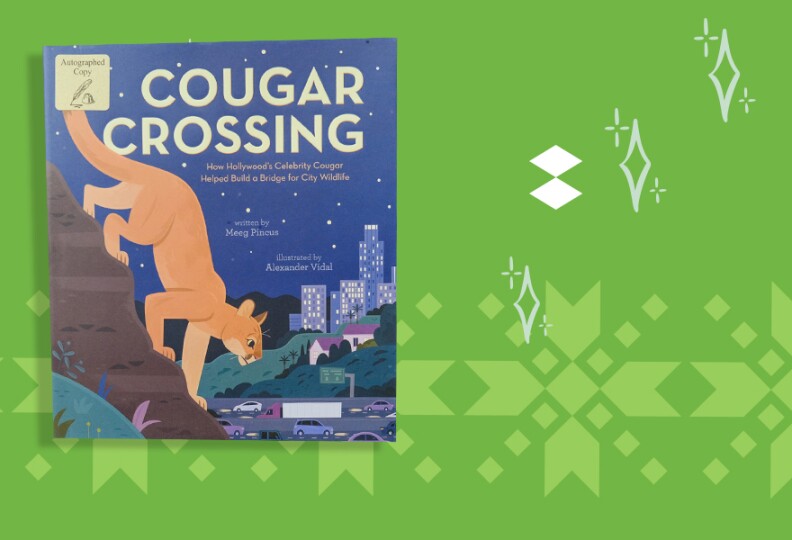 A book cover depicting a large tan mountain lion walking down a brown slope with a cityscape in the background. The title reads Cougar Crossing.