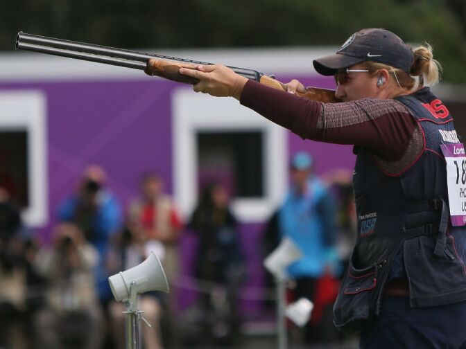 Gold medallist Kimberly Rhode of the U.S. takes aim as she takes part in the women's skeet competion at The Royal Artillery Barracks.