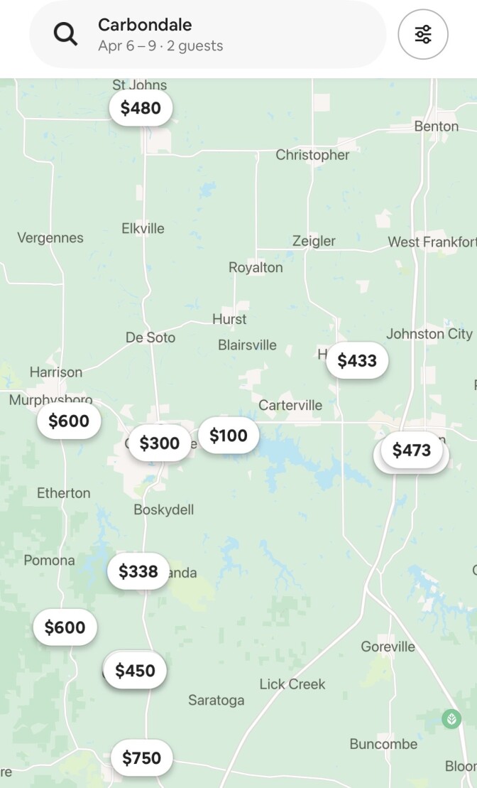A screenshot of a map of southern Illinois, specifically around the city of Carbondale. There are several white pop-ups with prices in black bold text in the middle scattered throughout the area.