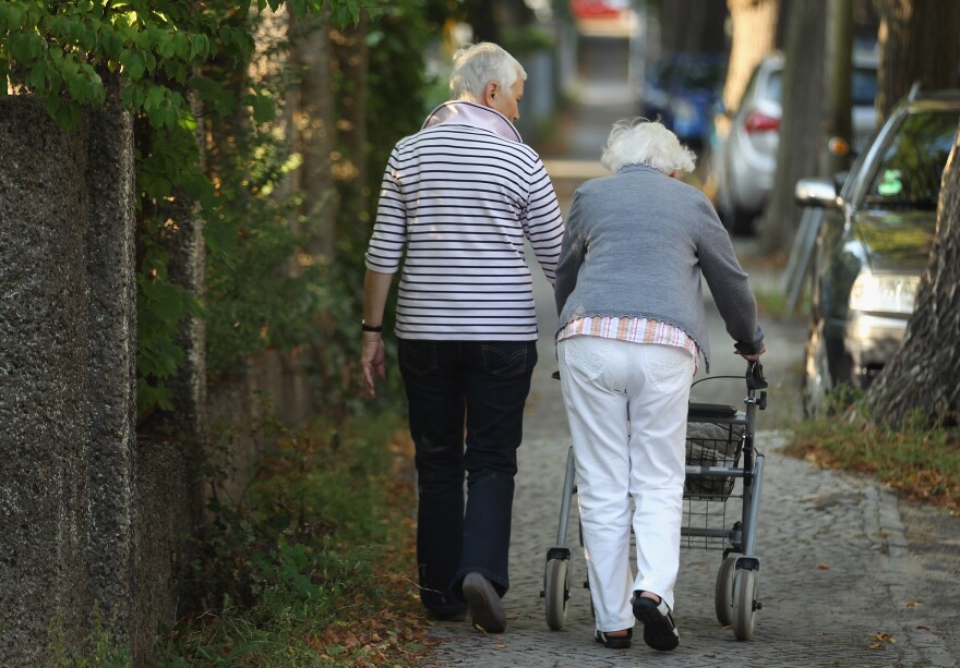 BERLIN, GERMANY - SEPTEMBER 18: Two generations of elderly women, one using a push-stroller, walk on September 18, 2012 in Berlin, Germany. Germany is facing multiple problems stemming from an increase in the elderly proportion of its population, including increasing health care costs, strains on its social security system, a shortage of senior care workers and challenges to its labor market. (Photo by Sean Gallup/Getty Images)
