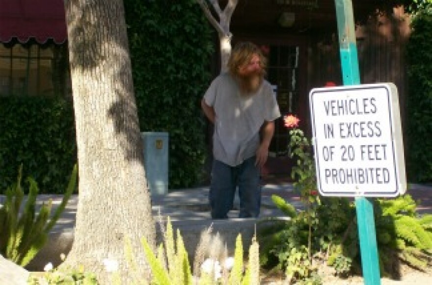 A photograph of Kelly Thomas in downtown Fullerton, CA.