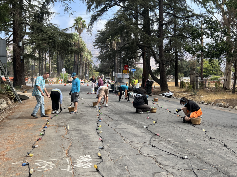 Volunteers with the Christmas Tree Lane Association started to string lights in September.