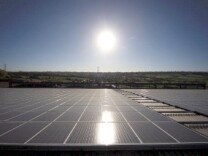 Gov. Jerry Brown signed a bill into law requiring California to use more renewable sources of energy, such as the solar panels seen here, by 2020.