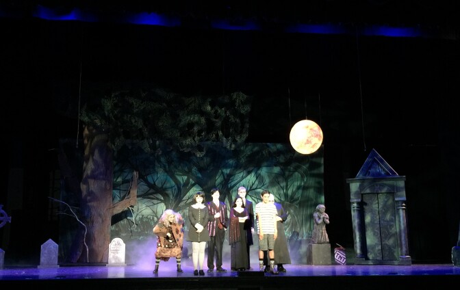 Students at Claremont High School perform as the Addams Family. 
