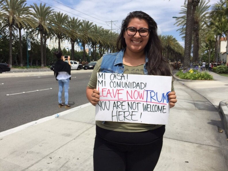 Natalie Magaña, 25, of Anaheim: "My mother and father moved here from Mexico ... We can't support Trump." (Outside the Anaheim Donald Trump rally on Wednesday, May 25, 2016.)