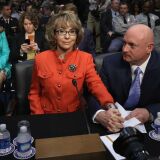 Retired NASA astronaut and Navy Capt. Mark Kelly (R) and his wife, shooting victim and former U.S. Rep. Gabby Giffords (D-AZ) prepares to give an opening statement before the Senate Judiciary Committee during hearing about gun control on Capitol Hill January 30, 2013 in Washington, DC. Giffords delivered an opening statment to the committee, which met for the first time since the mass shooting at a Sandy Hook Elementary School in Newtown, Connecticut.   