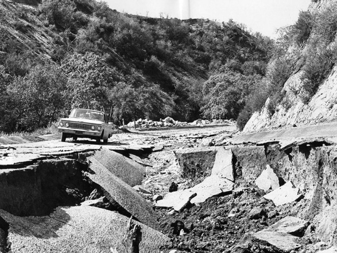 April 14, 1965: Rain water broke the pavement surface of a street in Burbank's Wildwood Canyon Park. Officials said the area would be closed until repairs could be made. (Photograph courtesy of the Los Angeles Public Library)