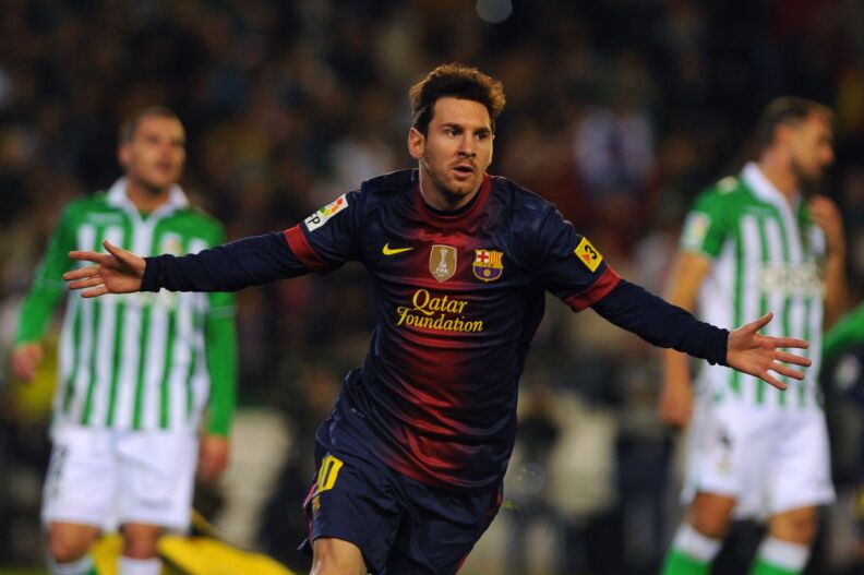 Barcelona's Argentinian forward Lionel Messi celebrates after scoring during the Spanish league football match Real Betis vs FC Barcelona on December 9, 2012 at the Benito Villamarin stadium in Sevilla.