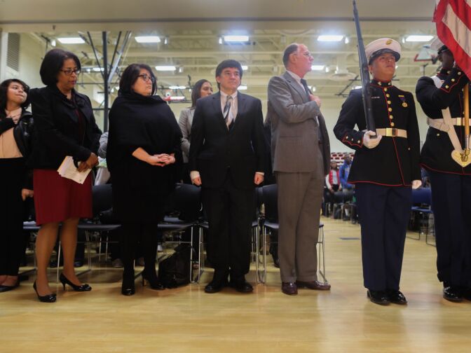 Mayoral Candidate Jan Perry look on as the honor guard works presents the flags at the ribbon cutting ceremony for South Regional High School #12. Her Ninth district has long been viewed as a seat of black political power. 