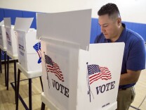 Felix Martinez of El Sereno votes at a polling place inside Barrio Action Youth & Family Center on Tuesday afternoon, June 7, 2016 during the California primary election.