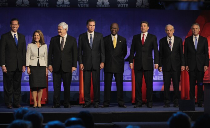 ROCHESTER, MI - NOVEMBER 09:  Republican presidential candidates (L to R) former U.S. Senator from Pennsylvania Rick Santorum, U.S. Representative Michele Bachmann (R-MN), former Speaker of the House Newt Gingrich, former Massachusetts Governor Mitt Romney, businessman Herman Cain, Texas Governor Rick Perry,  U.S. Representative Ron Paul (R-TX), and former Utah Governor Jon Huntsman, are introduced at a debate hosted by CNBC and the Michigan Republican Party at Oakland University on November 9, 2011 in Rochester, Michigan. The debate is the first meeting of the eight GOP presidential hopefuls since allegations of sexual impropriety have surfaced against front-runner Herman Cain.  (Photo by Scott Olson/Getty Images)