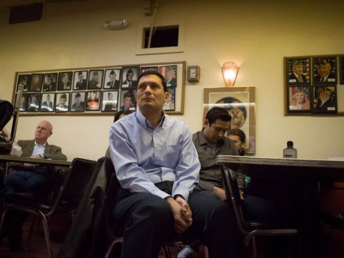 Darin Selnick, vice president of development for the GI Film Festival, listens to a speaker at a meeting of Veterans in Film and Television at the American Legion Post 43 on Highland Avenue in Hollywood.