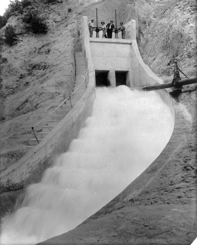 View of “Cascades” marking the terminus of Los Angeles Aqueduct at the southern end of the Newhall Pass in what would be present day Sylmar. The original cascade of water can still be seen when traveling on Interstate 5 through Sylmar in the San Fernando Valley. On November 5, 1913, over 40,000 Los Angeles residents came to the San Fernando Valley to see the first water from the Owens Valley complete the journey to Los Angeles. 