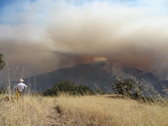 Donna Dormody watches as the Soberanes Fire overtakes her family's ranch in Carmel, California.