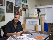 Mykael Williams-Wolf, 32, takes part in studio hours inside LAMP Community's art studio in Skid Row on Wednesday, April 22, 2015. After being homeless for three years, Williams-Wolf has a place to live.