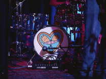 The cartoon character Arnold from Hey Arnold! is on a kick drum 