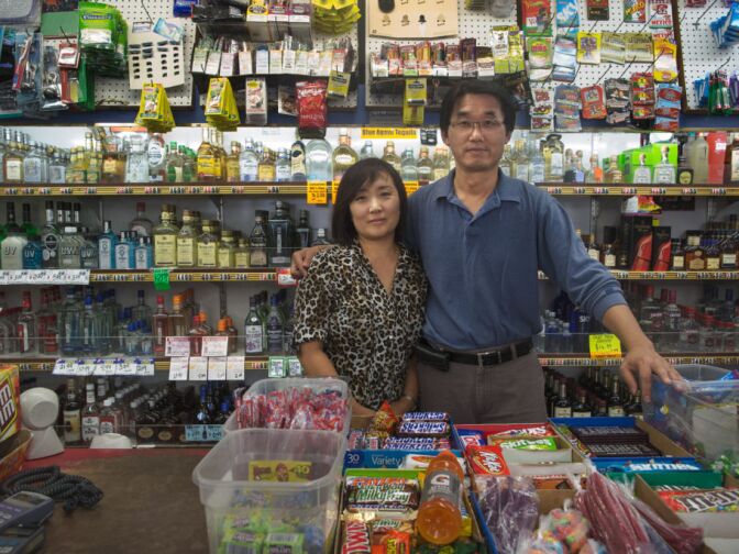 Jaeil Yoo and Sanghui Yoo own All Star liquor, which is across the street from the new Walmart Neighborhood Store. The Walmart will not initially have a liquor license and the Yoos hopes that they will be able to keep their business.
