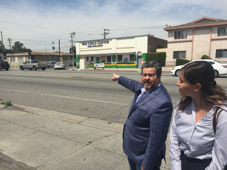 Loyola Law School Project for the Innocent Director Adam Grant and law student Dinora Perez near the scene of the shooting that landed Marco Contreras in prison.