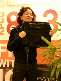 Off-Ramp producer Queena Kim strikes a pose with the coveted laptop bag. 