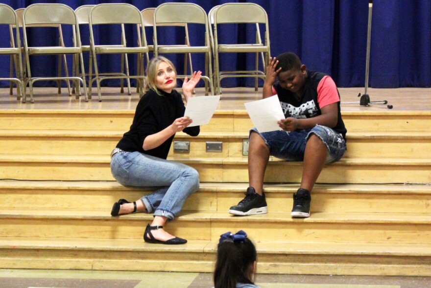 Actress Cameron Diaz, the school's celebrity mentor through Turnaround Arts: California, reads a scene from Shrek with fifth grader Kirk Clarke in February.
