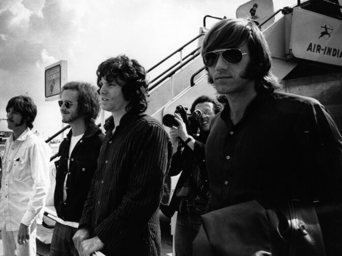 The Doors at London Airport in 1968. Left to right: John Densmore, Robby Krieger, Jim Morrison and Ray Manzarek. Manzarek died May 20 of bile-duct cancer.