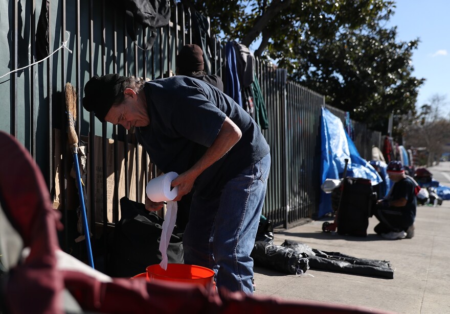 LOS ANGELES, CA - JANUARY 24:  Rene Conant, a homeless man, packs up his camp on January 24, 2017 in Los Angeles, California. According to a 2016 report by  the U.S. Department of Housing and Urban Development, Los Angeles has the highest number of homeless people in the nation with close to 13,000 living on the streets. The annual Greater Los Angeles Homeless Count begins today and will continue through Thursday.  (Photo by Justin Sullivan/Getty Images)