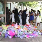 HOUSTON, TEXAS - JUNE 09: Family and friends of George Floyd enter the Fountain of Praise church for his funeral on June 9, 2020 in Houston, Texas. Floyd died May 25 while in Minneapolis police custody, sparking nationwide protests. (Photo by Joe Raedle/Getty Images)