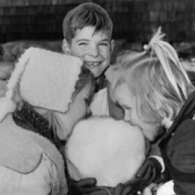 Kristen Wheatley (left), Jeff Reichmann and Gale Borden sample a giant snow cone on March 3, 1964 at their school.